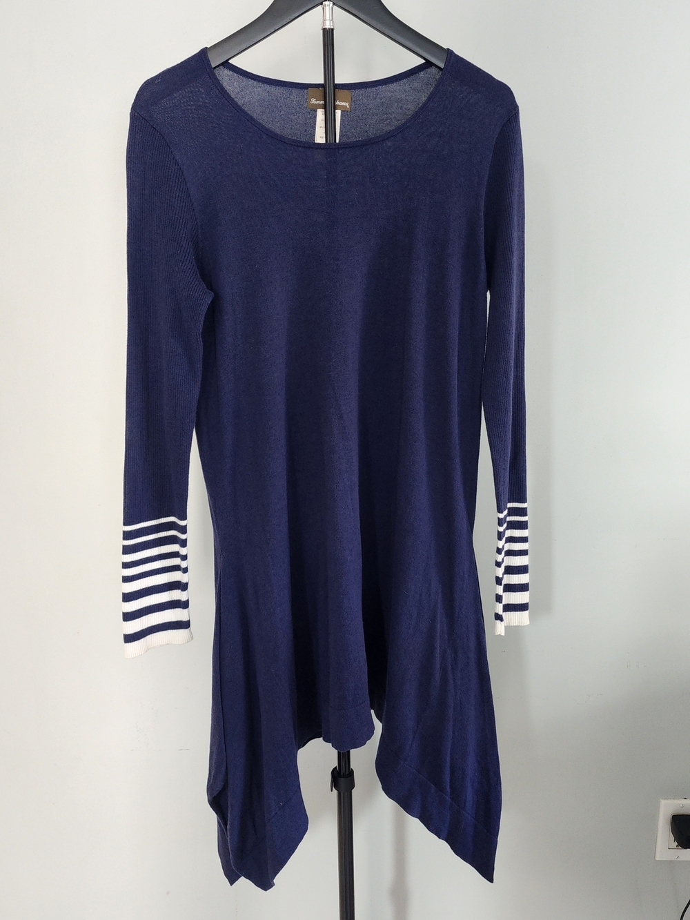 Tommy Bahama navy knit sweater dress featuring an asymmetrical handkerchief hem